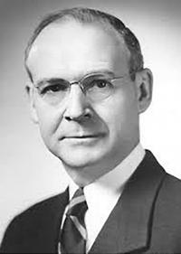 Headshot of Charles King.