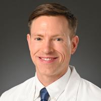 Michael Craddock Owen-Michaane, MD, MA, CNSC Profile Headshot